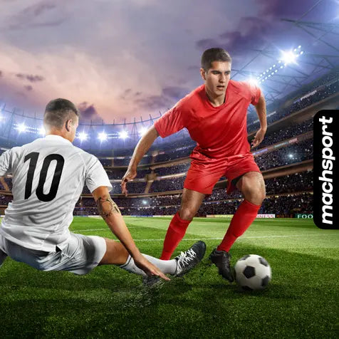 Fußballspieler und Fußball