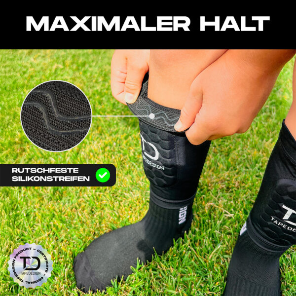 Tapedesign Schienbeinschoner Shinguard Sleeve Kinder, schwarz - machsport – Bild 